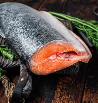 big-piece-of-raw-cut-salmon-fish-on-a-wooden-cutti-2021-12-09-03-21-07-utc.jpg