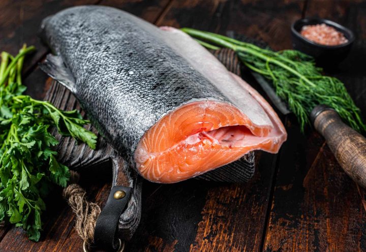 big-piece-of-raw-cut-salmon-fish-on-a-wooden-cutti-2021-12-09-03-21-07-utc.jpg